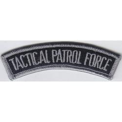 Tactical Patrol Force silver-grey on dark navy blue rocker tab patch